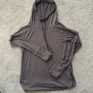 Women’s Athleta long sleeve Uptempo hooded shirt. Heathered maroon/purple color